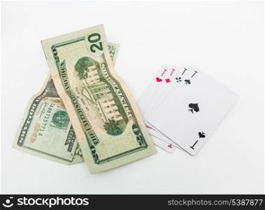 dollars and set of ace on white