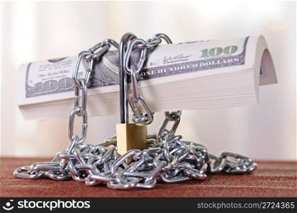 Dollars are closed on the padlock and a chain