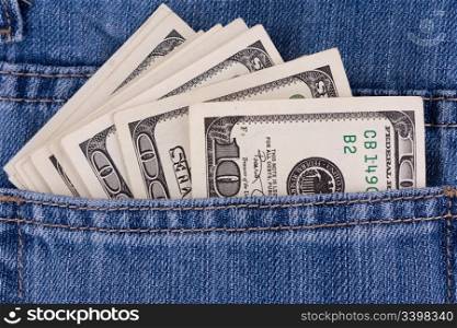 Dollars in a pocket of jeans