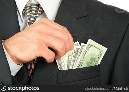 Dollars in pocket of coat and hand