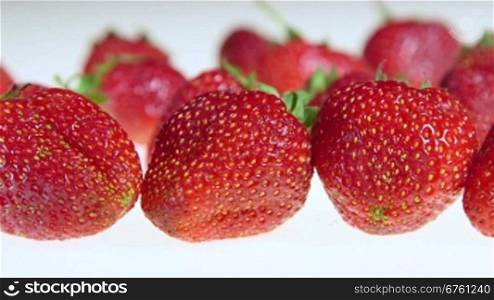 Dolly: Fresh strawberry fruit background close-up