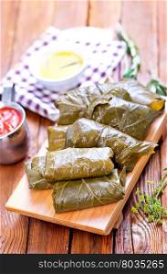dolma with sauce and spice on the tray