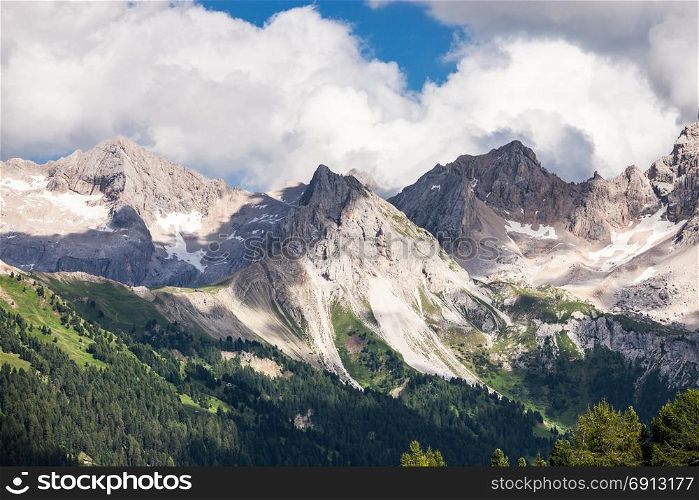 Dolomites Alps summer cloudy mountain valley, Italy