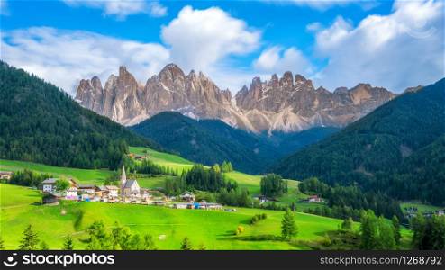 Dolomites Italy landscape at Santa Maddalena or St. Magdalena village with Geisler or Odle Dolomites Group. The beautiful mountain landscape attracts tourist to travel to Dolomites in Northern Italy.