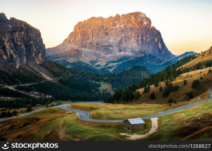 Dolomites Italy Panoramic Landscape. Sunrise shines on Sassolungo Langkofel Group, Passo Gardena, Western Dolomites travel and outdoor activity. Breathtaking landscape and travel in Northern Italy.