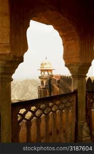 Dome of a fort viewed through a balcony, Jaigarh Fort, Jaipur, Rajasthan, India