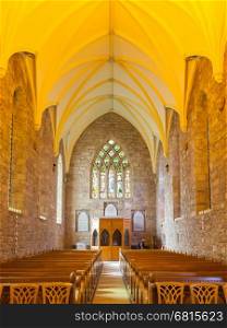 Dome of small Scottish cathedral, yellow lights