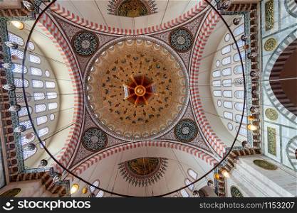 Dome of the in Suleymaniye mosque photo taken with a wide angle on October 27, 2019 in Istanbul, Turkey.