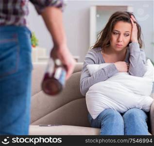 Domestic violence concept in a family argument with drunk alcoholic husband. Domestic violence concept in a family argument with drunk alcoho