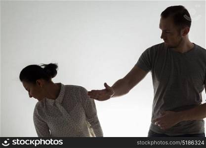 domestic violence, people and abuse concept - couple having fight and man slapping woman. couple having fight and man slapping woman