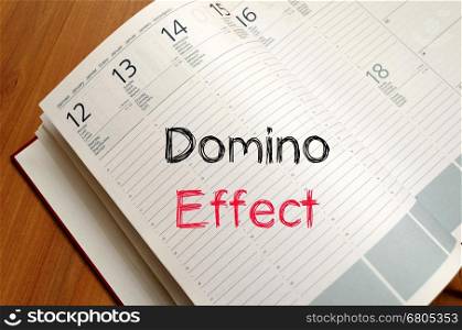 Domino effect text concept write on notebook