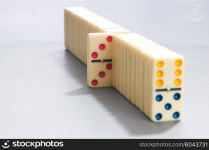 Domino effect with many pieces