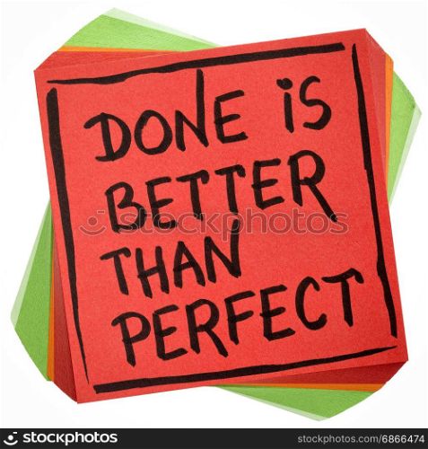 Done is better than perfect reminder - handwriting in black ink on an isolated sticky note