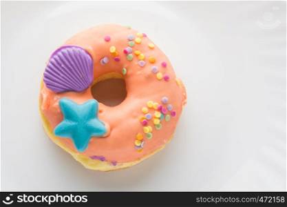 Donut on a white plate, donut with white background