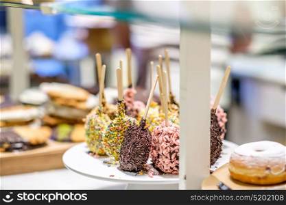 Donuts in assortment at confectionery store
