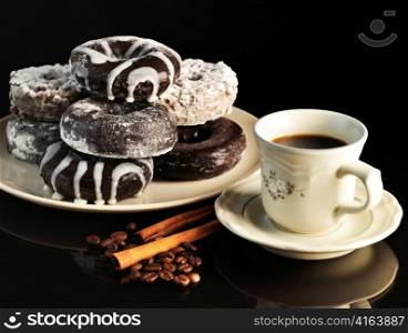 donuts on a plate and cup of coffee