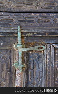 door abstract spain canarias brass brown knocker in a green closed wood lanzarote