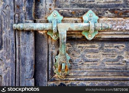 door abstract spain canarias brass brown knocker in a green closed wood lanzarote