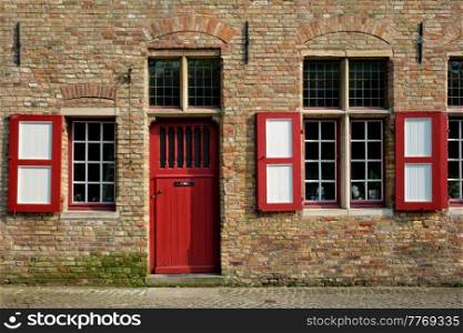 Door and window of an old house, Bruges  Brugge , Belgium. House in Bruges Brugge , Belgium