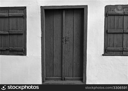 Door and wooden window shutters. Black and white