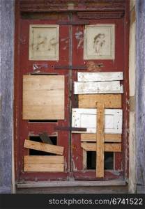 Door-blocked up and nailed. Door in an old house - blocked up and nailed