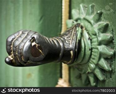 Door Handle Fist. old door handle in form of a fist
