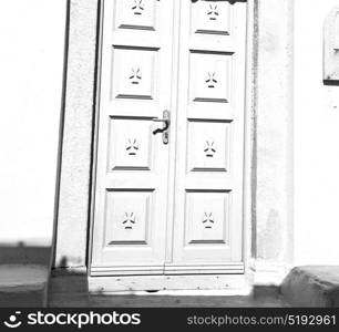 door in antique village santorini greece europe and white wall