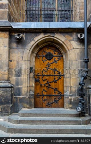 Door in castle, ancient European town, nobody. Summer tourism and travels, famous europe landmark, popular places