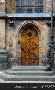 Door in castle, ancient European town, nobody. Summer tourism and travels, famous europe landmark, popular places