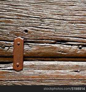 door in italy old ancian wood and traditional texture nail