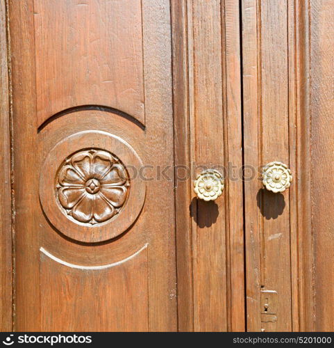 door in italy old ancian wood and traditional texture nail