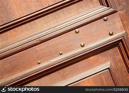 door in italy old ancian wood and traditional texture nail