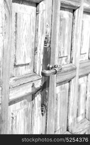 door in italy old ancian wood and traditional texture nail