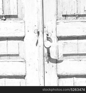 door in italy old ancian wood and traditional texture nail