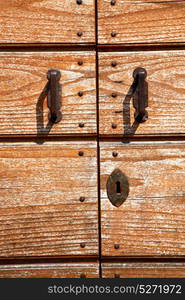 door in italy old ancian wood and traditional texture nail