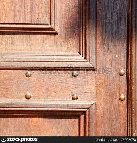 door in italy old ancian wood and trasditional texture nail