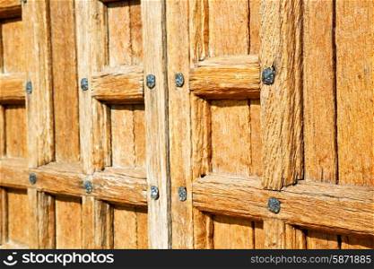 door in italy old ancian wood and trasditional texture nail