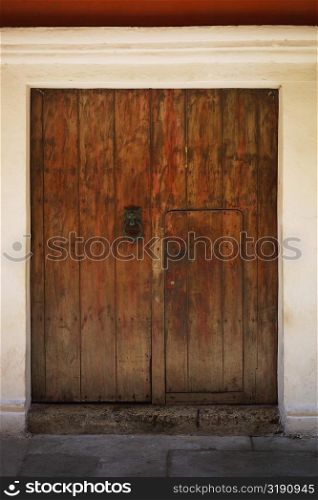 Door knocker on a wooden door, Cartagena, Colombia