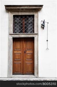 Door of old house with doorbell
