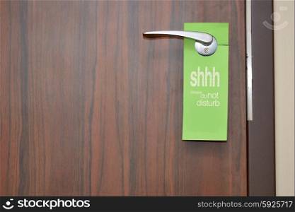 Door with do not disturb sign