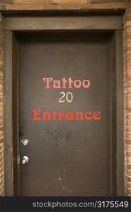 Doorway entrance to tattoo parlor.