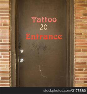 Doorway entrance to tattoo parlor.
