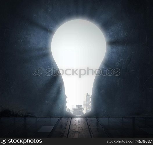 Doorway in wall. Doorway in dark wall shaped like light bulb
