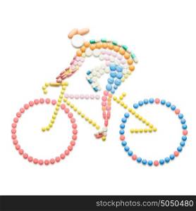 Doping drugs and pills in the shape of a road bicycle racer on a bike.
