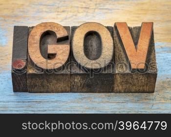 dot gov - government internet domain - text in vintage letterpress wood type blocks stained by color inks