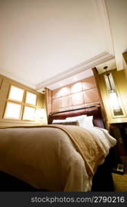 Double bed in the modern interior room