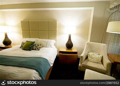 Double bed in the modern interior room