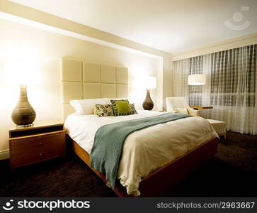 Double bed in the modern interior room