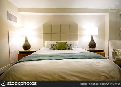 Double bed in the modern interior room