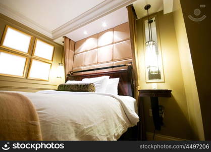 Double bed in the modern interior room